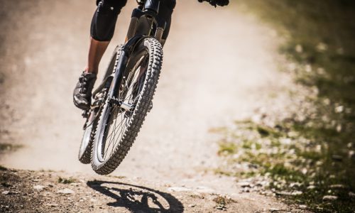 Close Up of wheel of jumping bike. Bike. Downhill.